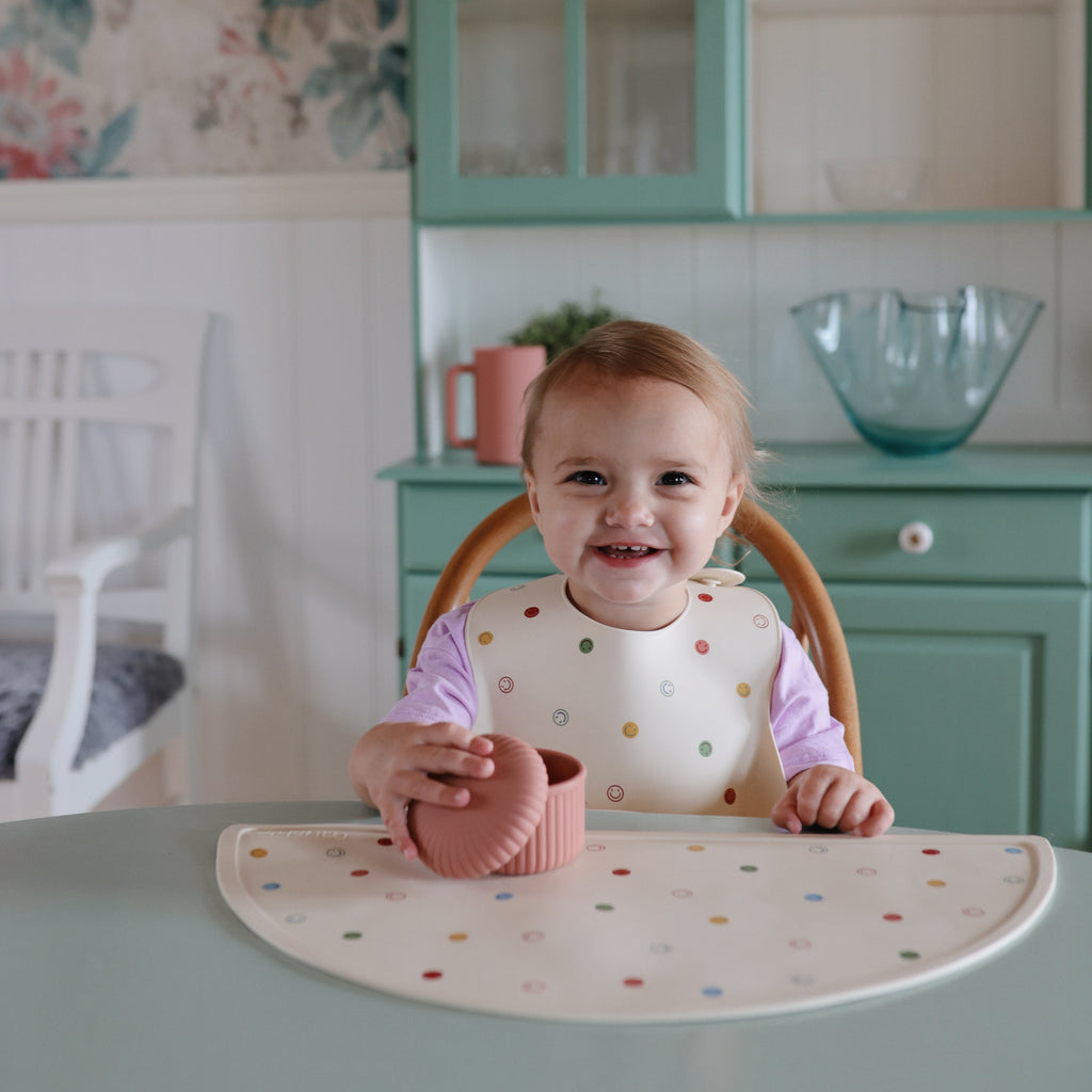 Mushie Silicone Baby Bib | Playroom Avenue