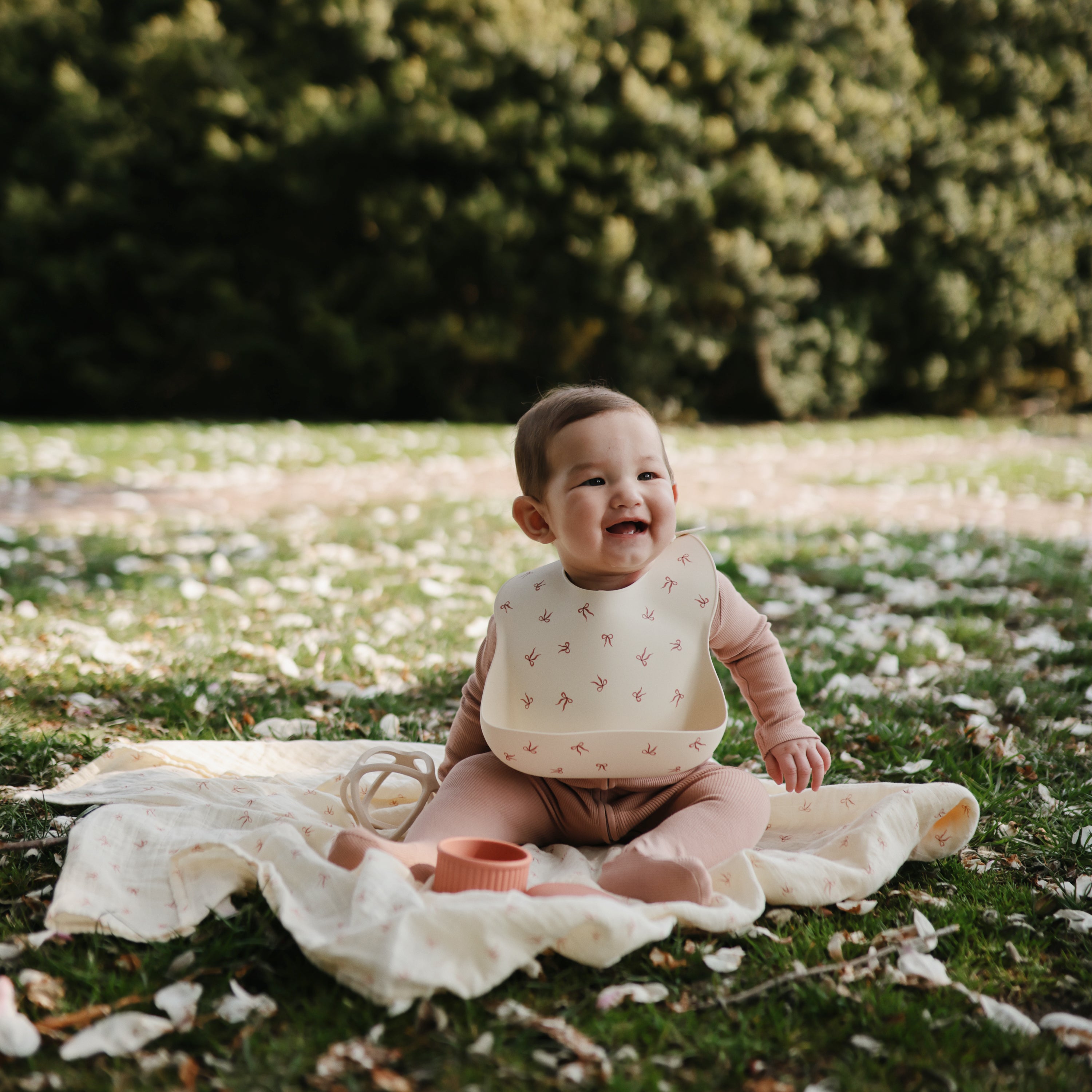 Mushie Silicone Baby Bib | Playroom Avenue