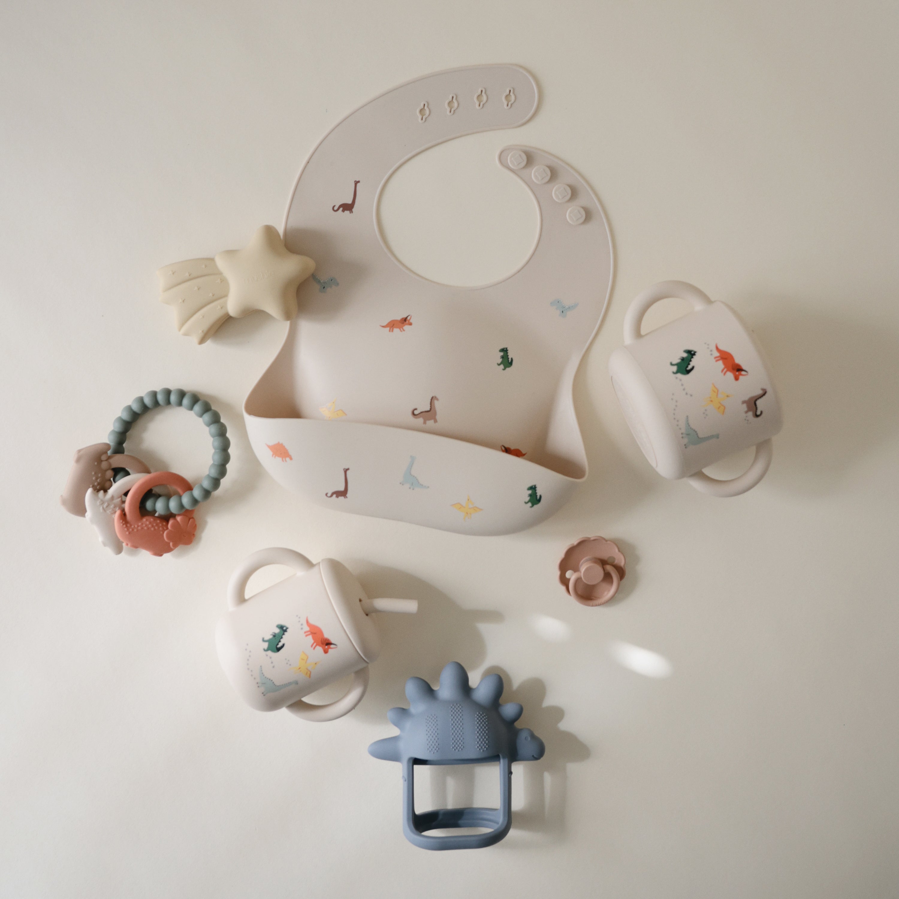 Mushie Silicone Baby Bib | Playroom Avenue