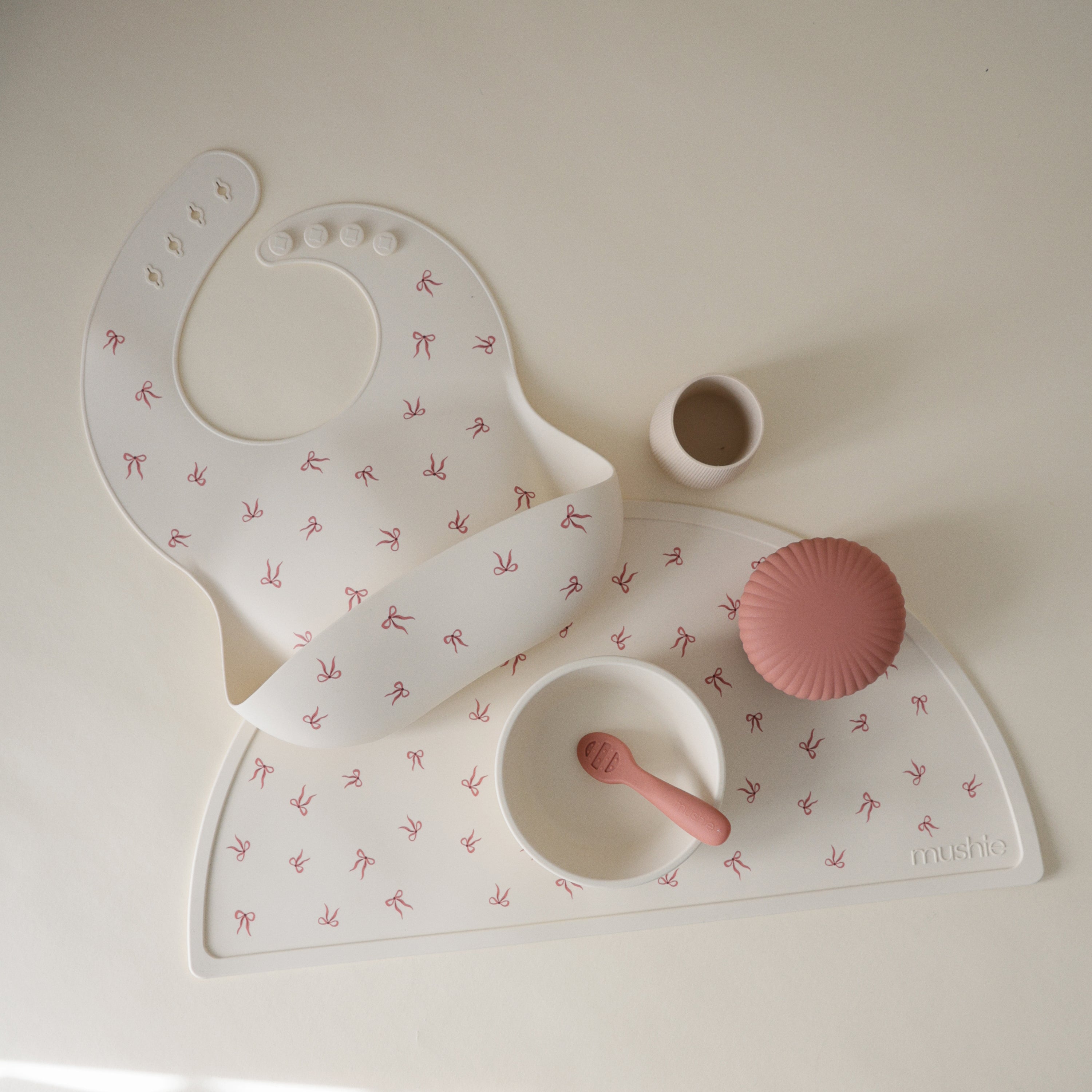 Mushie Silicone Baby Bib | Playroom Avenue