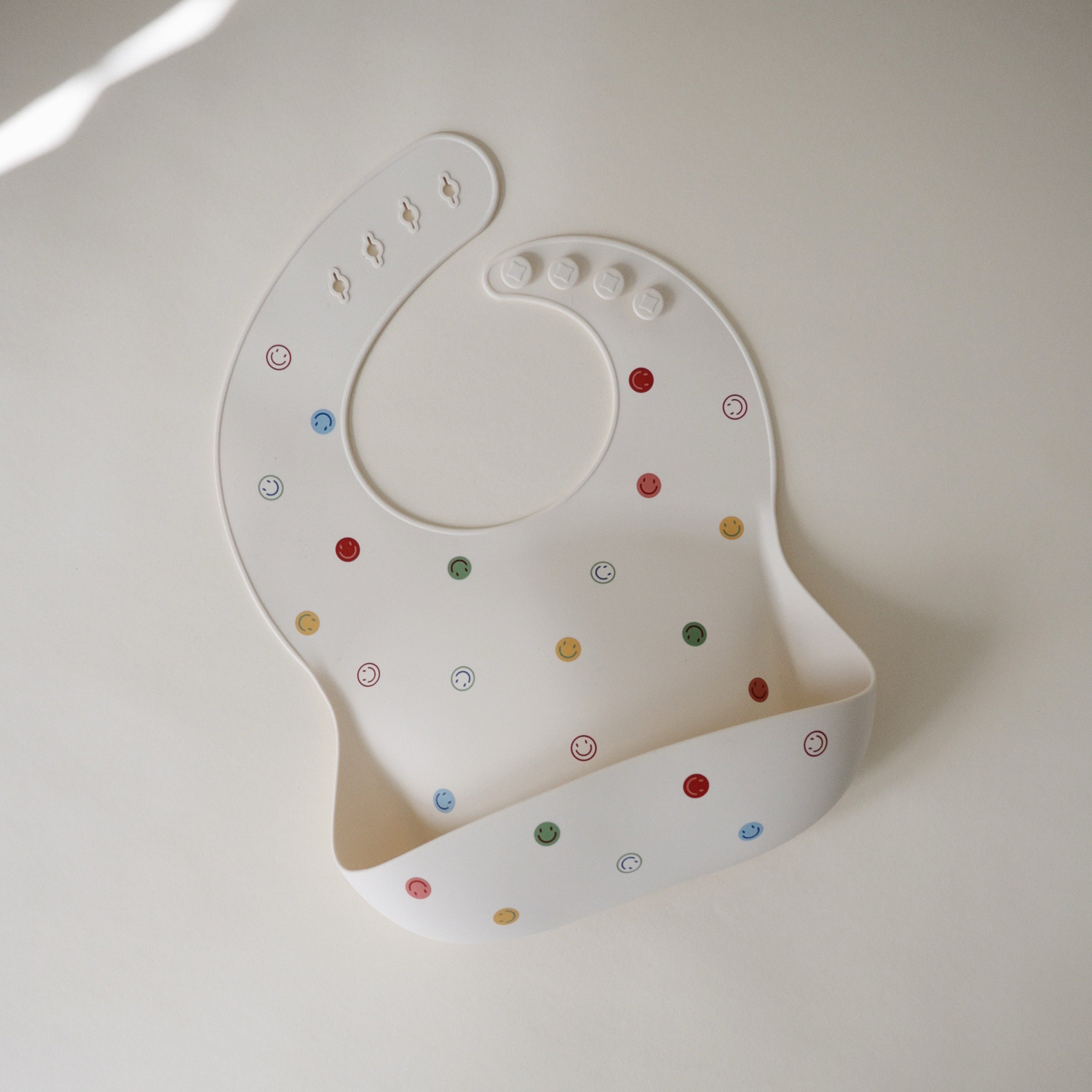 Mushie Silicone Baby Bib | Playroom Avenue