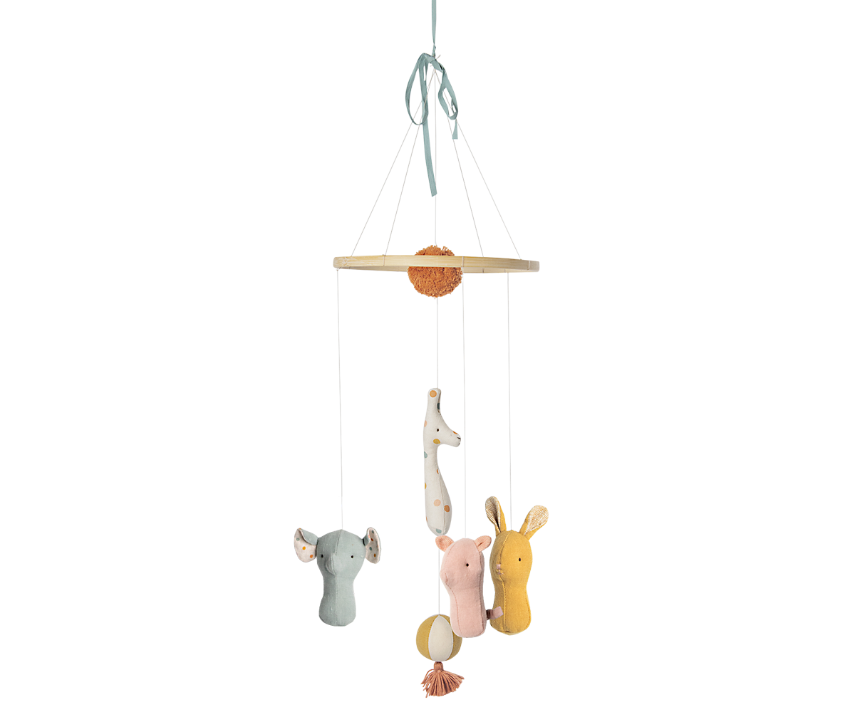 Children's mobile with hanging animal figures on a white background