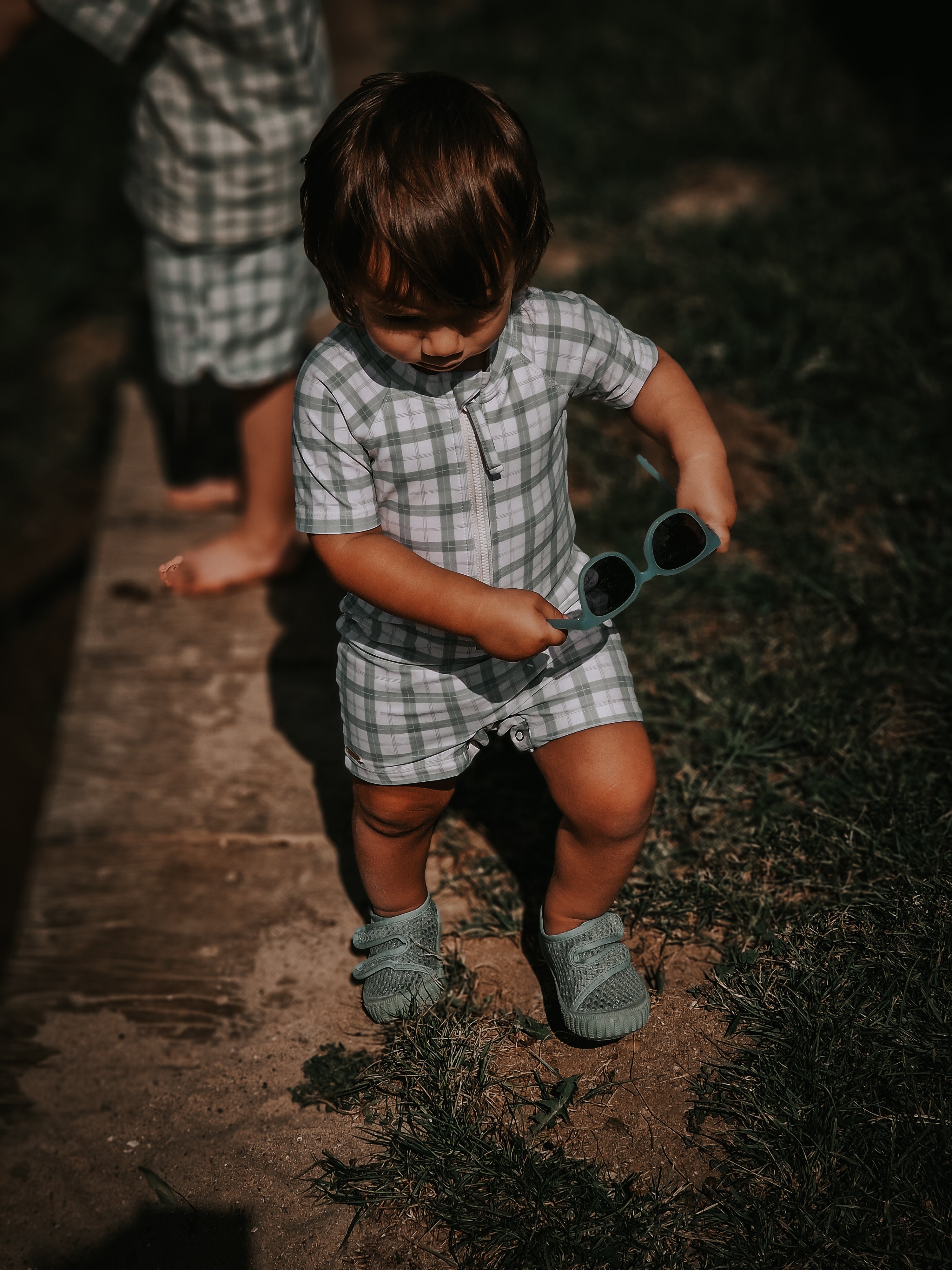 GRECH & CO. Short Sleeve Rashguard Swimsuit | UPF + Recycled - Fern Plaid | Playroom Avenue