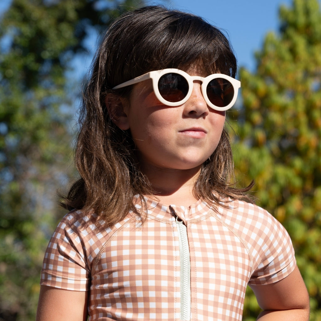 GRECH & CO. Short Sleeve Rashguard Swimsuit | UPF + Recycled - Sienna Gingham | Playroom Avenue