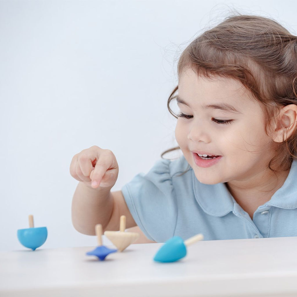 PlanToys Mini Spinning Tops | Playroom Avenue