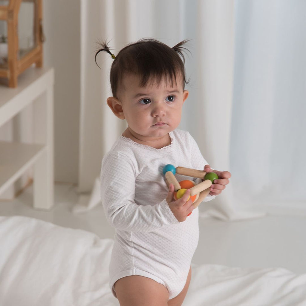 PlanToys Triangle Clutching Toy | Playroom Avenue