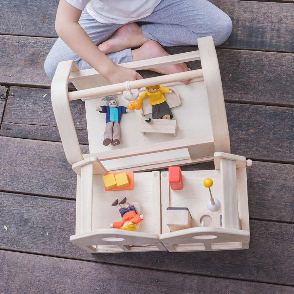 PlanToys Slide N Go Dollhouse | Playroom Avenue