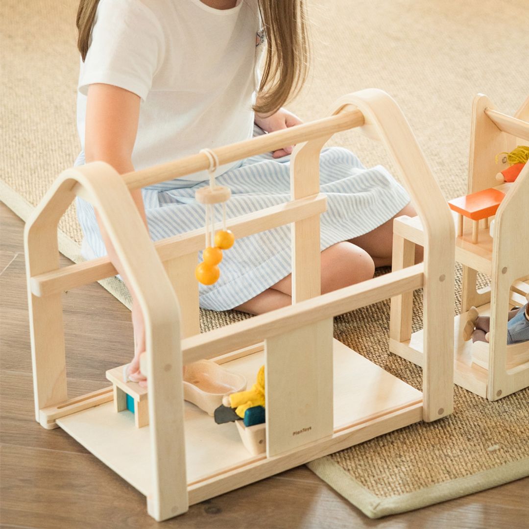 PlanToys Slide N Go Dollhouse | Playroom Avenue