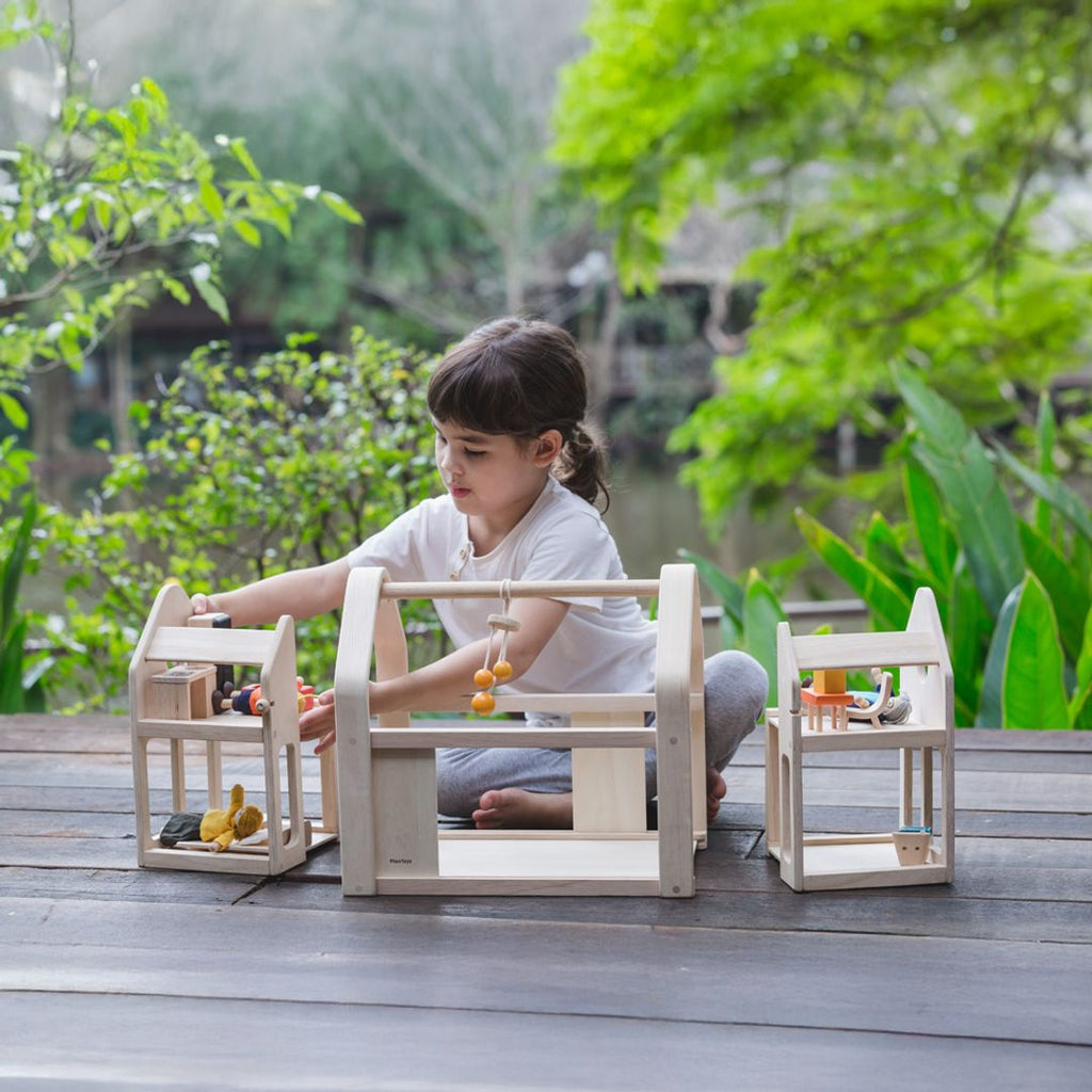 PlanToys Slide N Go Dollhouse | Playroom Avenue