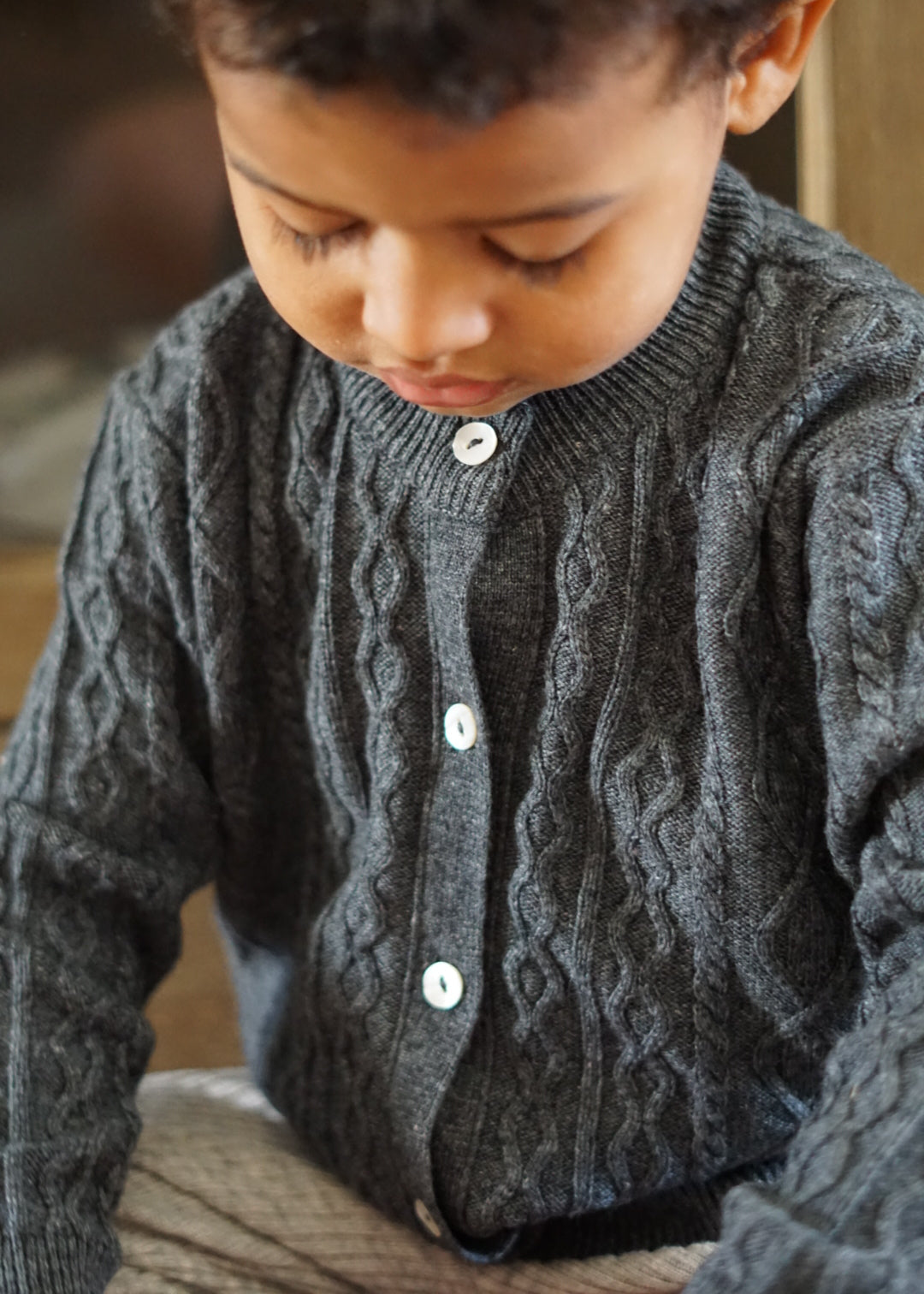 La Petit Lapin Cashmere & Merino Wool Cable Knit Cardigan | Dark Gray Melange | Playroom Avenue