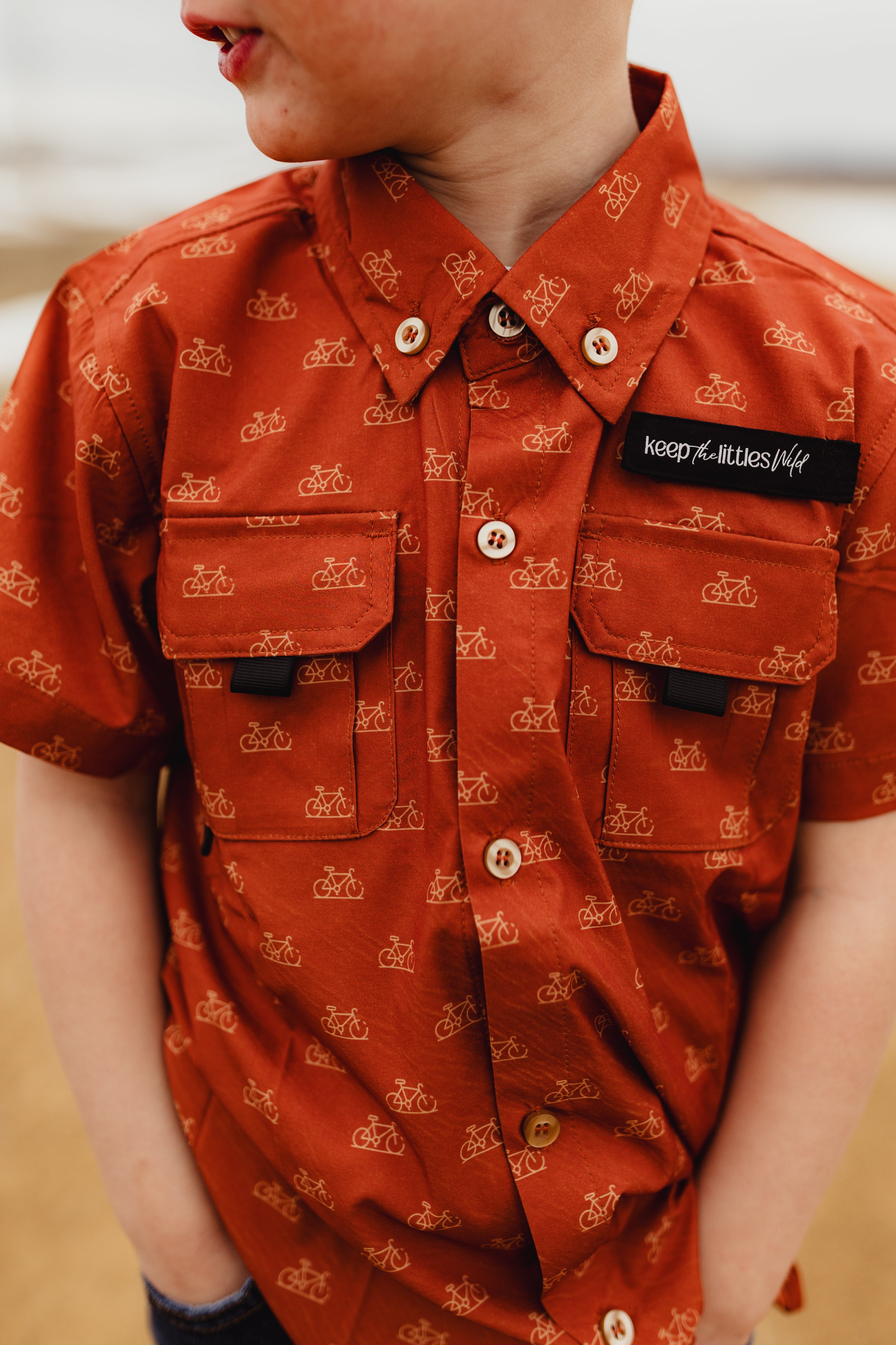 Keep the Littles Wild 2026 Fishing shirt button up- orange bike | Playroom Avenue