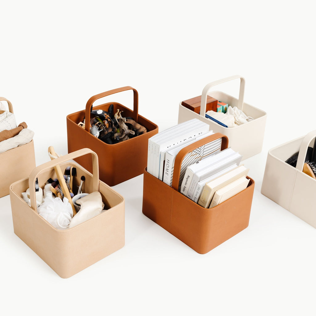 Gathre set of storage bins with handles on a white background