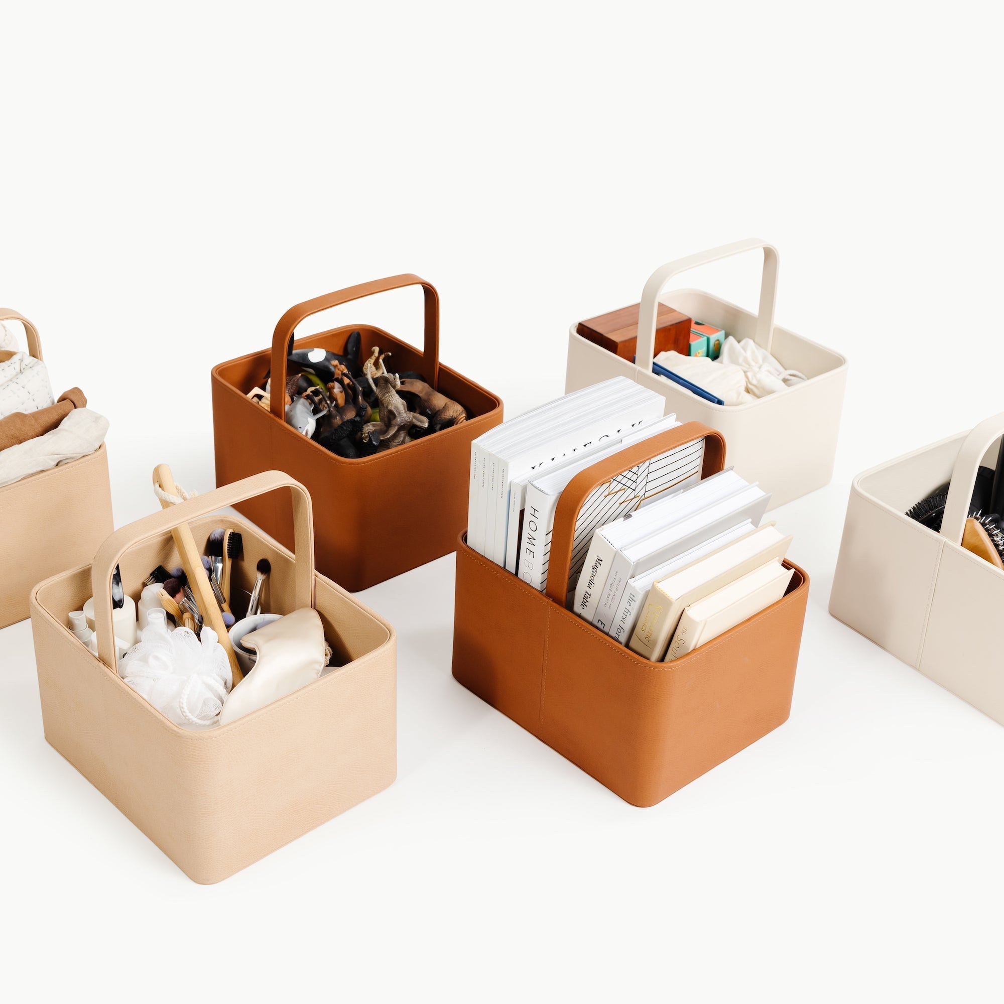 Gathre set of storage bins with handles on a white background