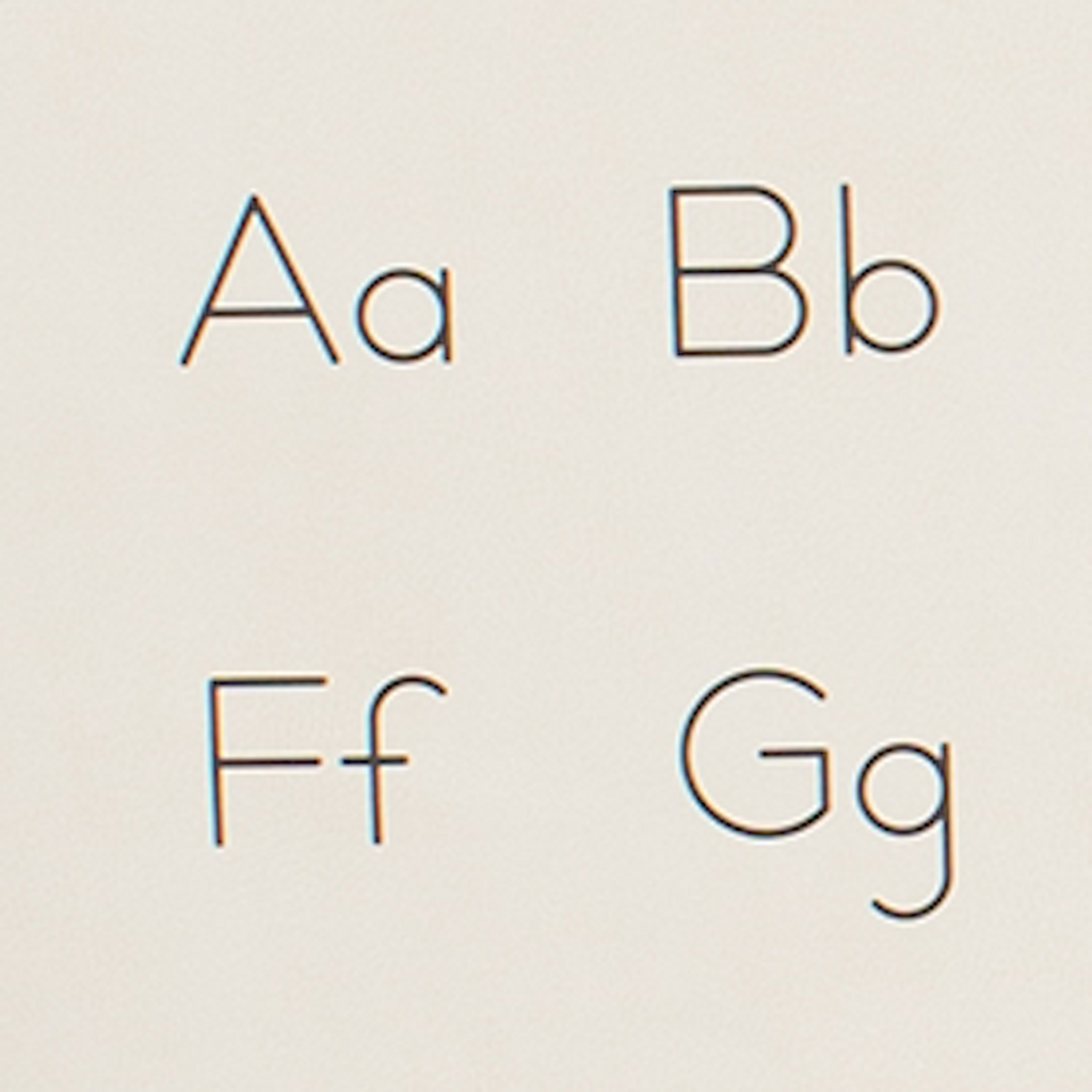 Alphabet letters A, B, F, and G on a beige background