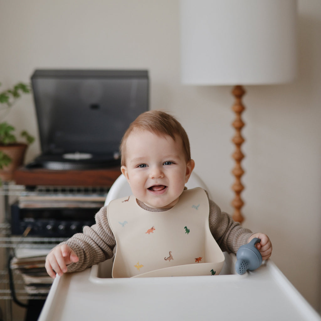 Mushie Silicone Baby Bib | Playroom Avenue