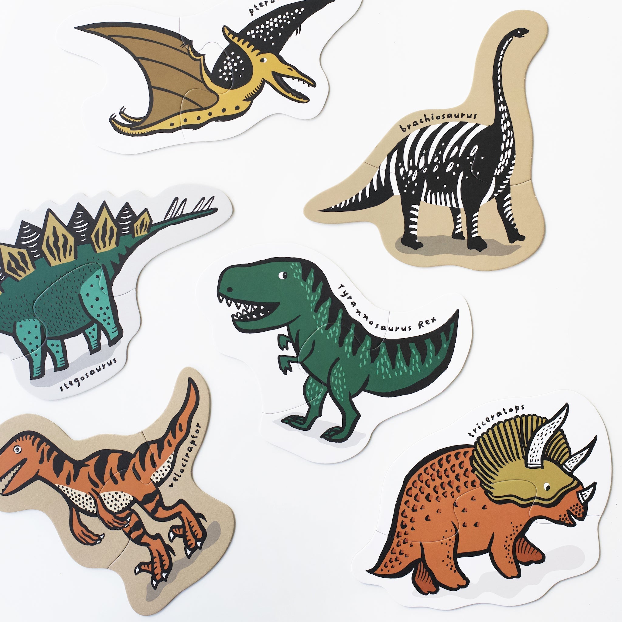 Set of colorful dinosaur stickers on a white background