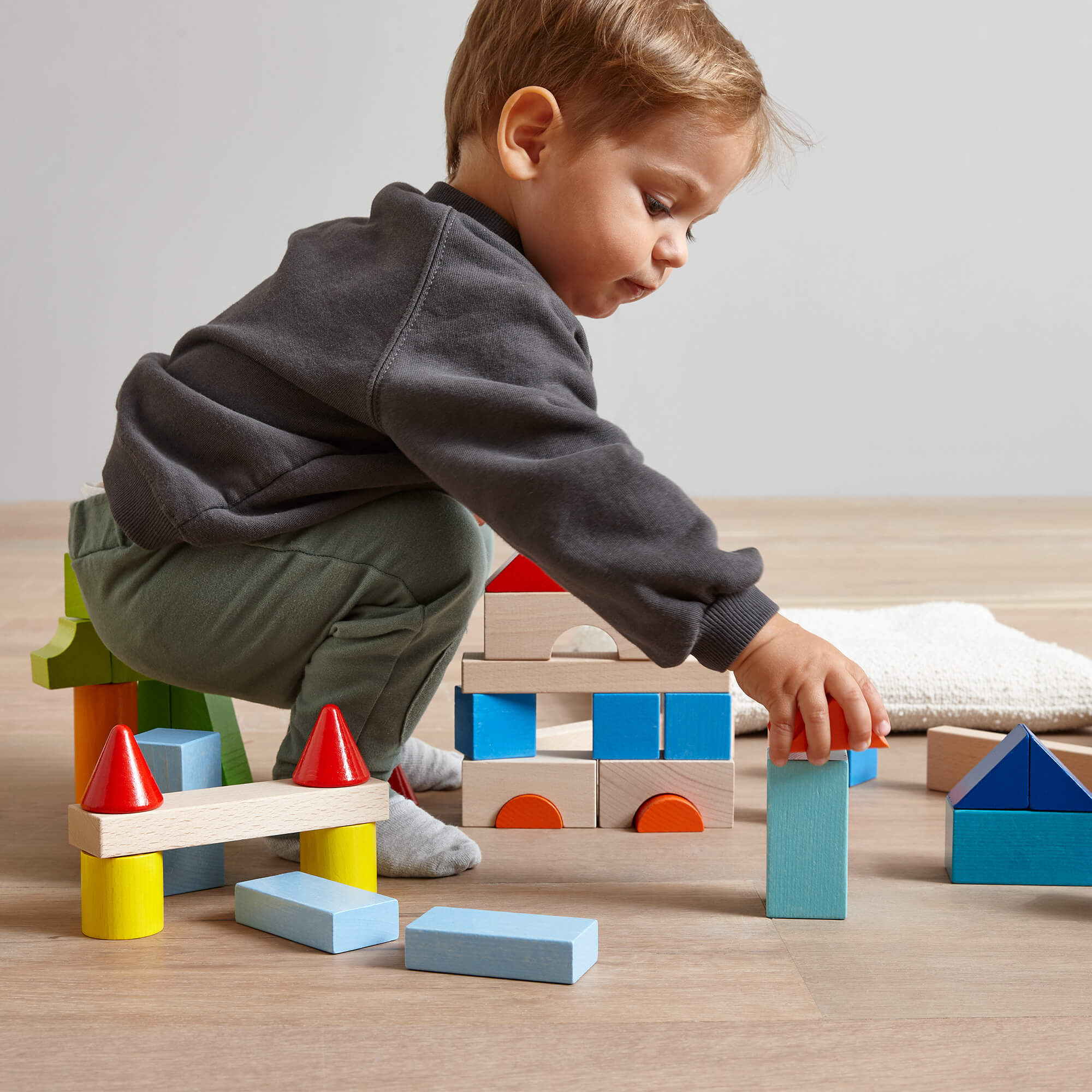 HABA Colored Wooden Building Blocks - 46 Piece Set | Playroom Avenue