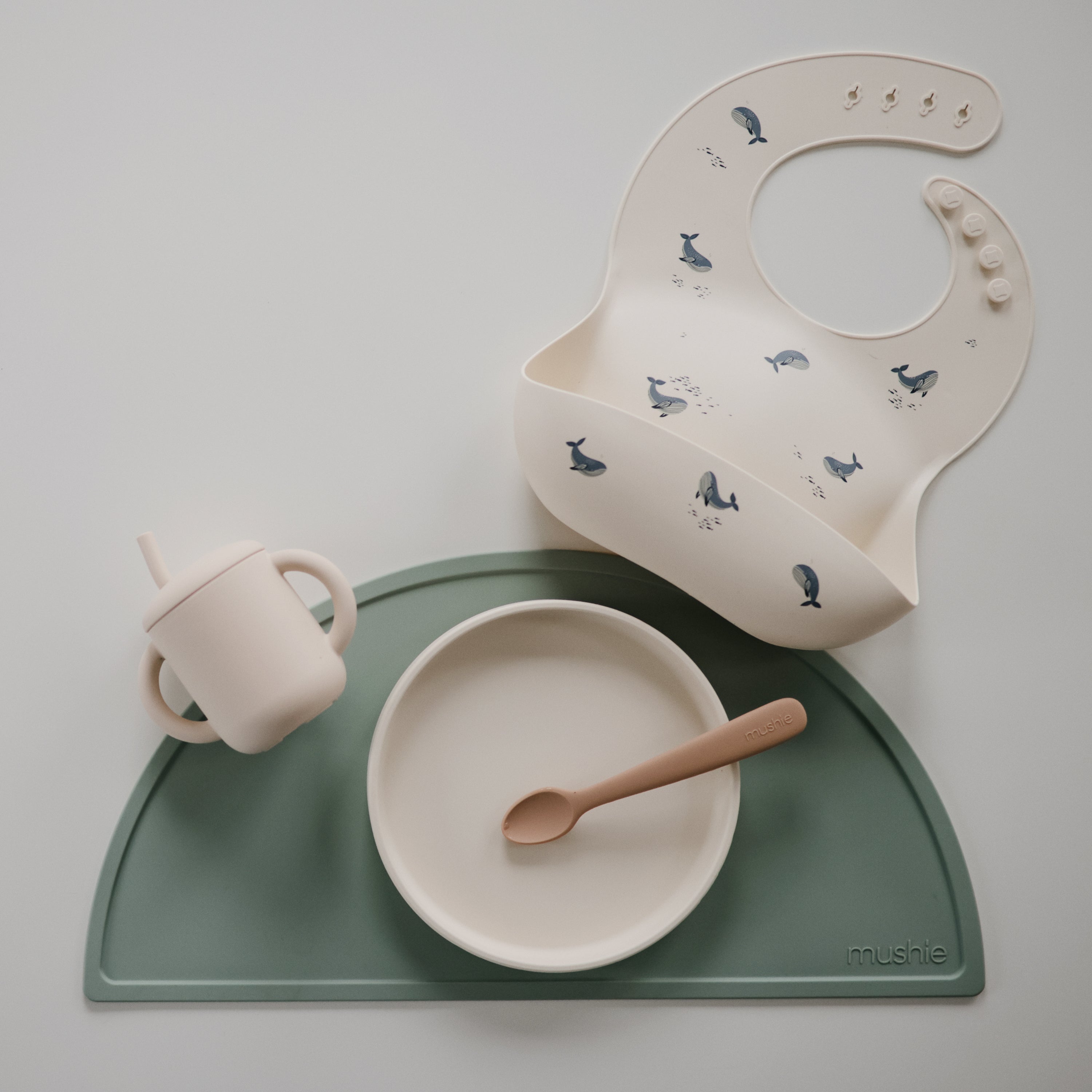 Mushie Silicone Baby Bib | Playroom Avenue