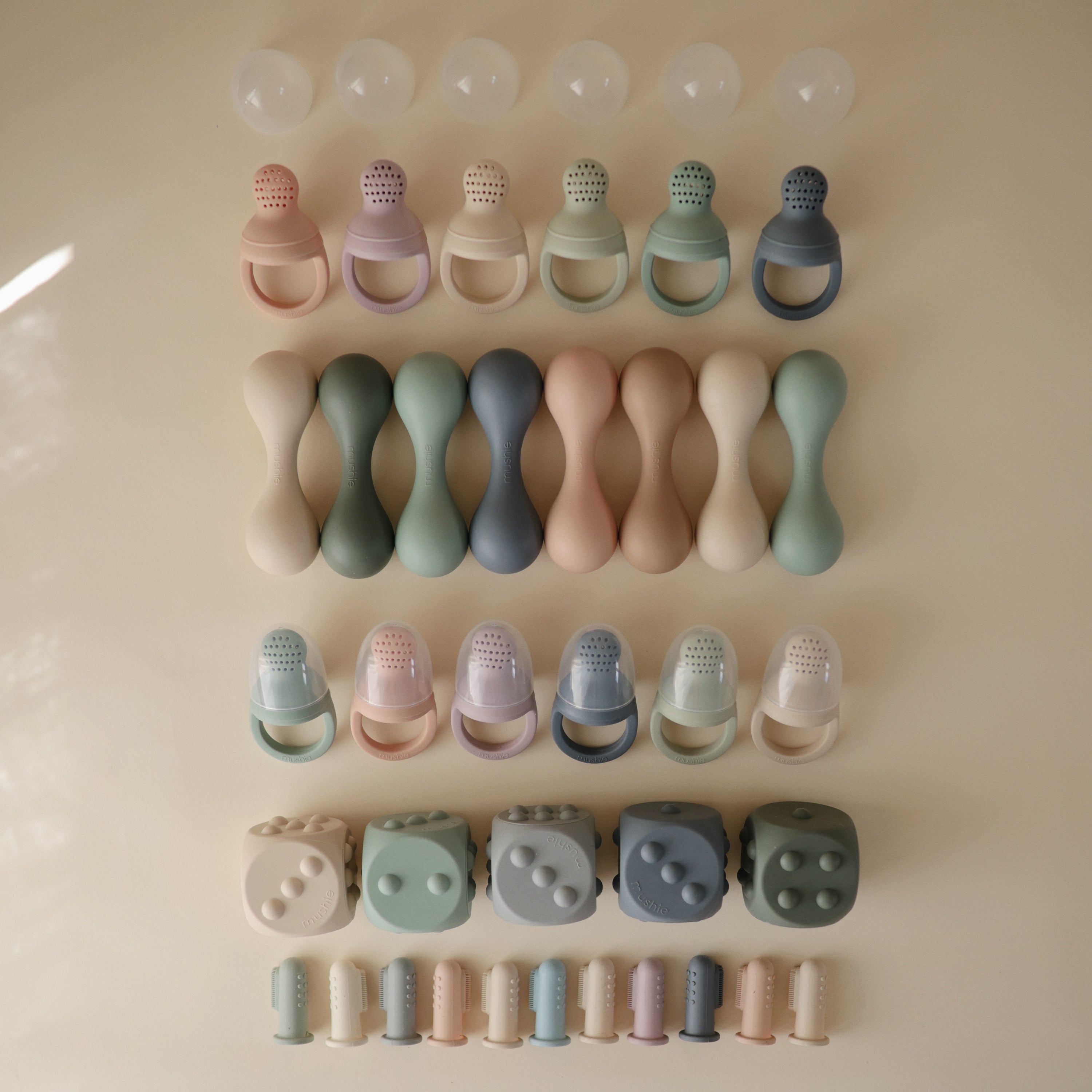 Mushie Silicone Baby Rattle Toy | Playroom Avenue