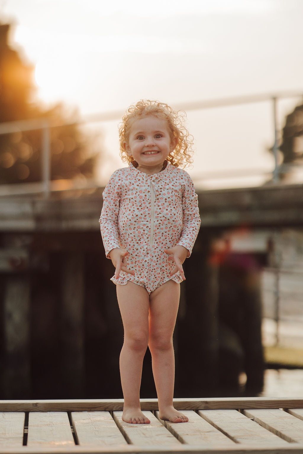 GRECH & CO. Long Sleeve Rashguard Ruffle Swimsuit | UPF + Recycled - Sunset Meadow | Playroom Avenue