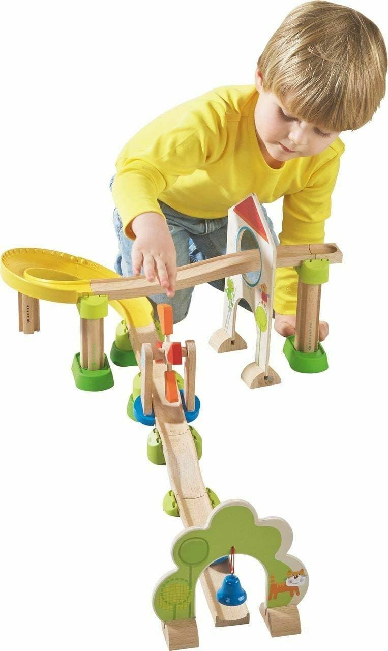 Child playing with HABA Kullerbu Windmill 25 Piece Starter Track Set - Ball Track System