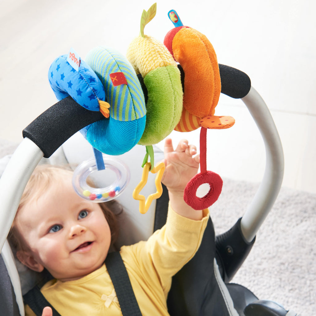 HABA Rainbow Activity Spiral Stroller & Car Seat Toy | Playroom Avenue