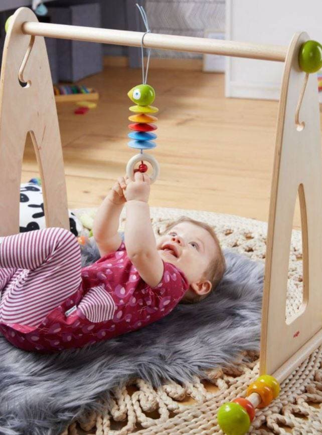 HABA Dangling Figure Parrot Stroller & Crib Toy