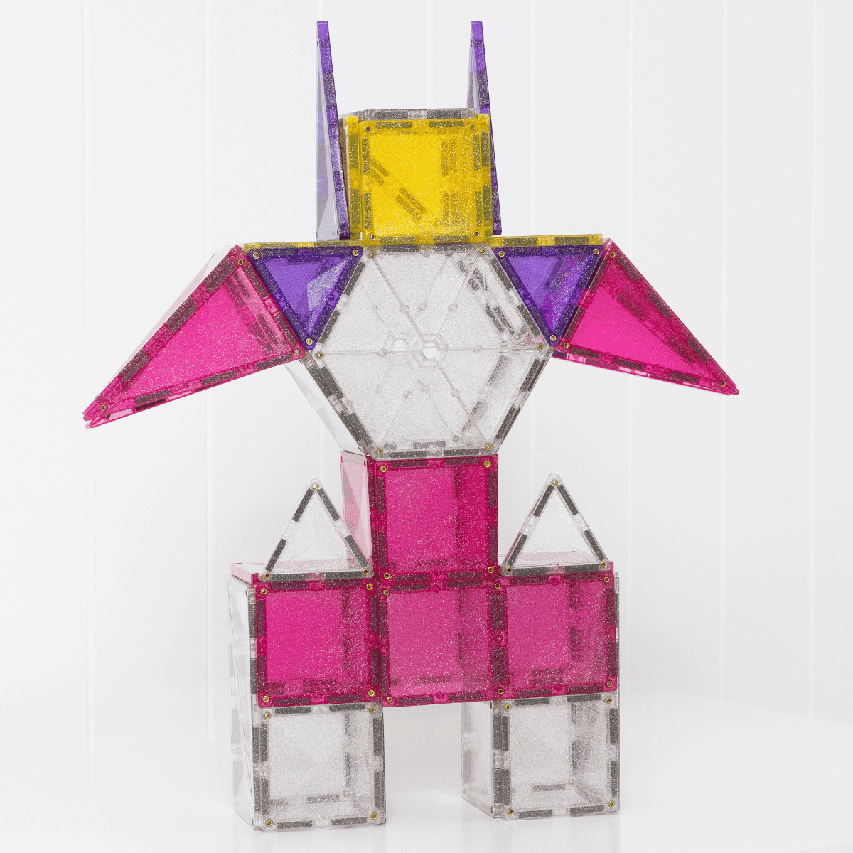 Colorful geometric toy structure on a white background