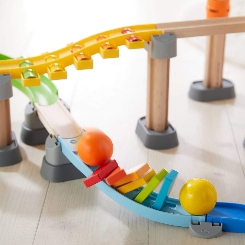 Close up of elements from the HABA Kullerbu Melody Dominoes Set - Musical Ball Track System | HABA USA
