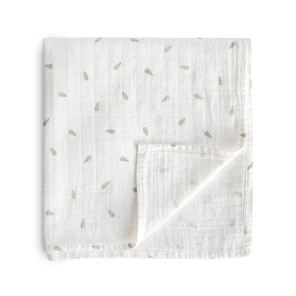 Mushie Organic Cotton Muslin Swaddle Blanket Leaves | Playroom Avenue