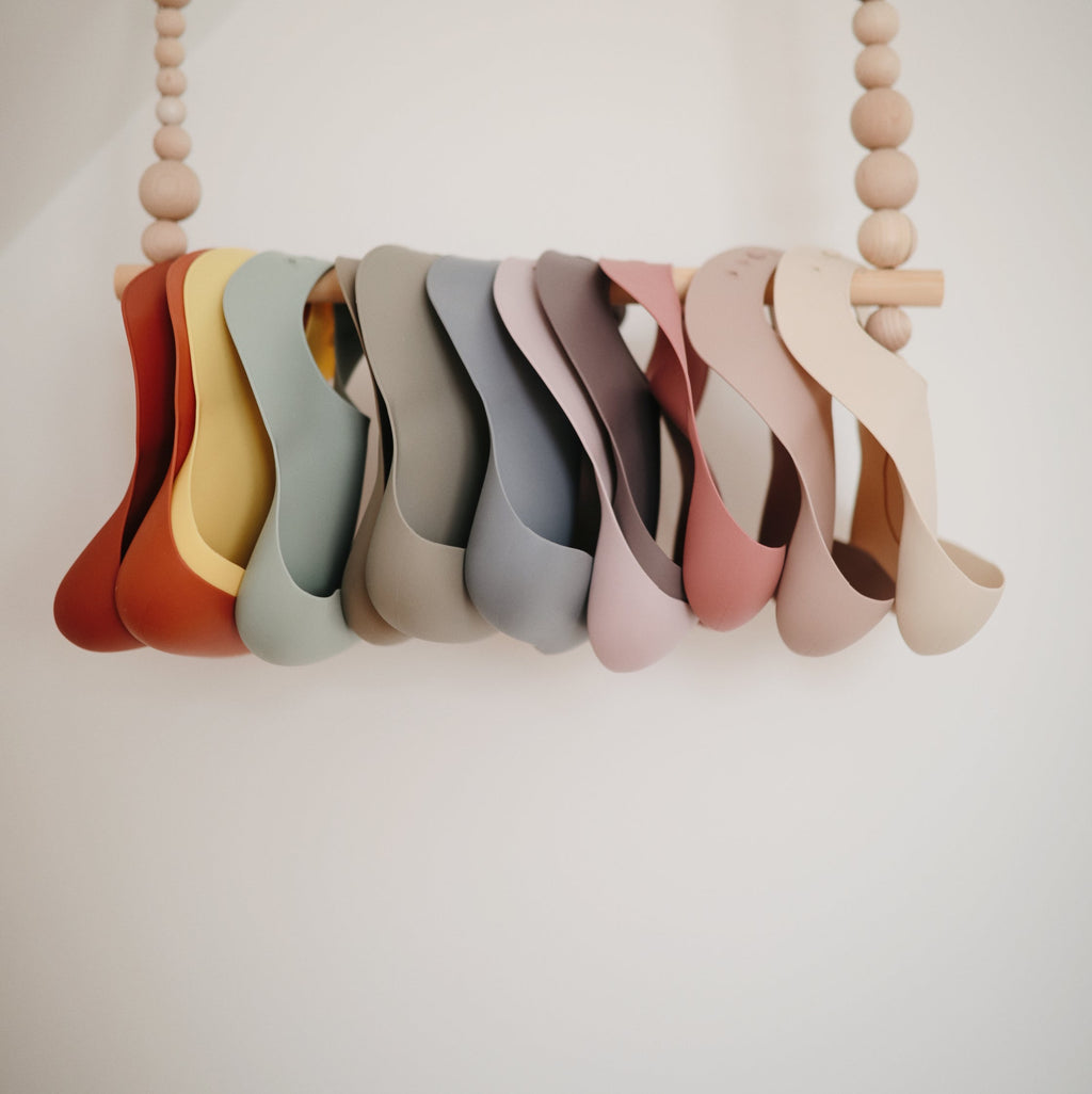 Mushie Silicone Baby Bib | Playroom Avenue