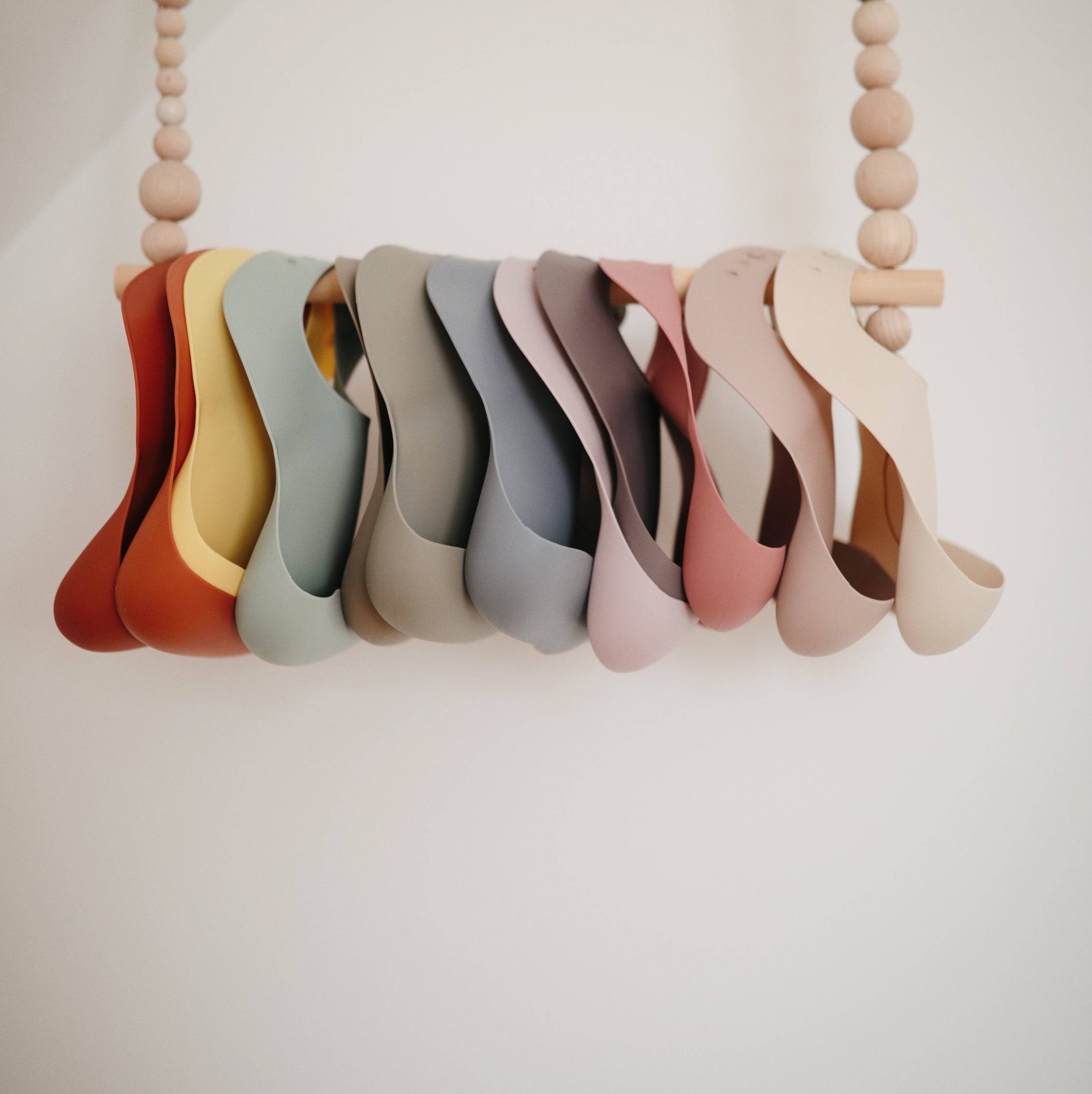 Mushie Silicone Baby Bib | Playroom Avenue