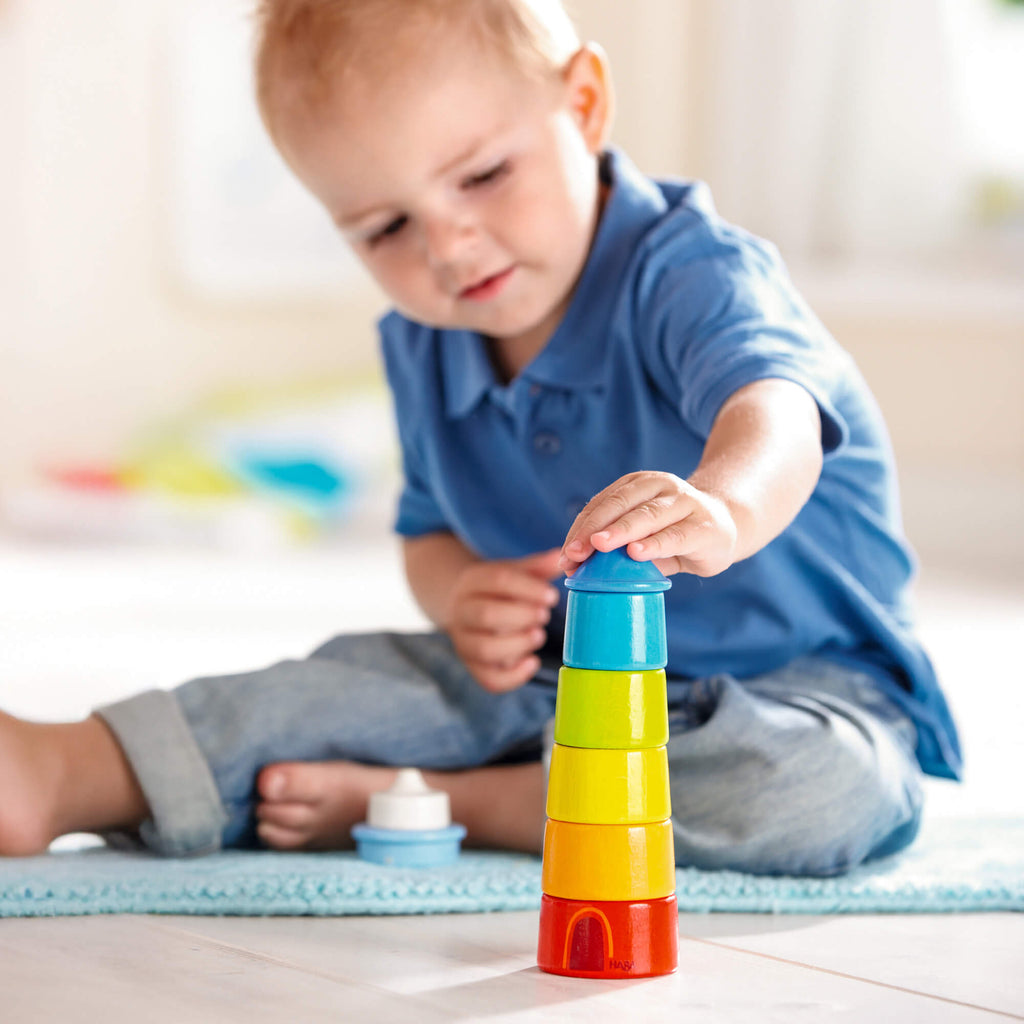 HABA Lighthouse Wooden Rainbow Stacker | Playroom Avenue