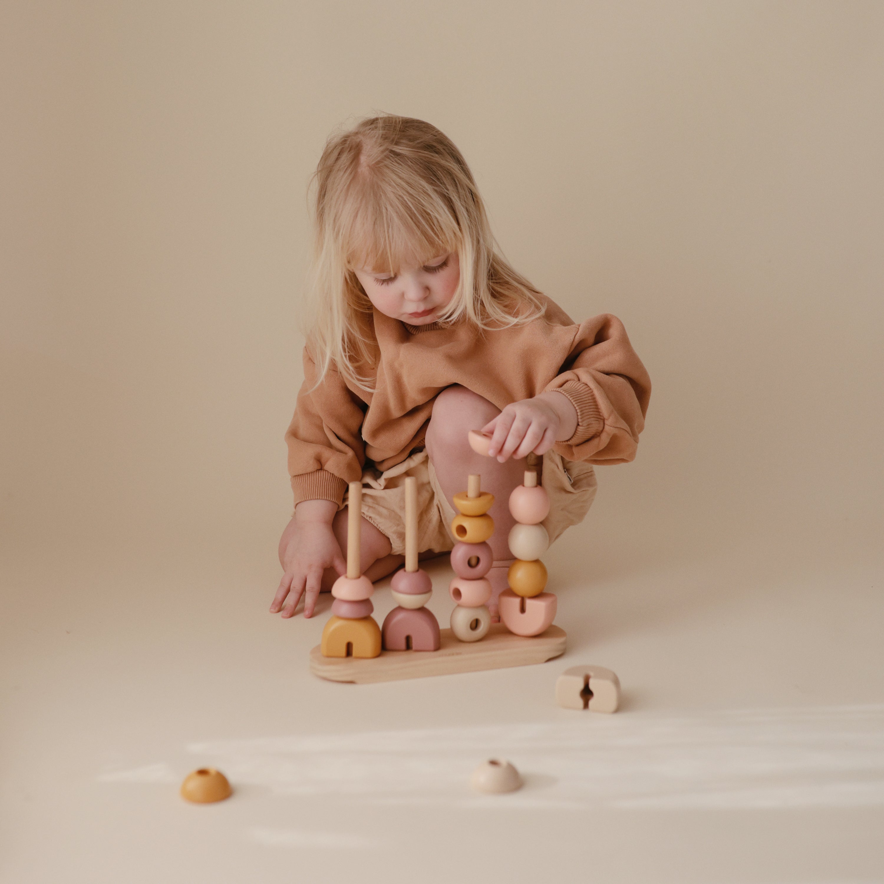 Mushie Wooden Multi Shape Stacker | Playroom Avenue